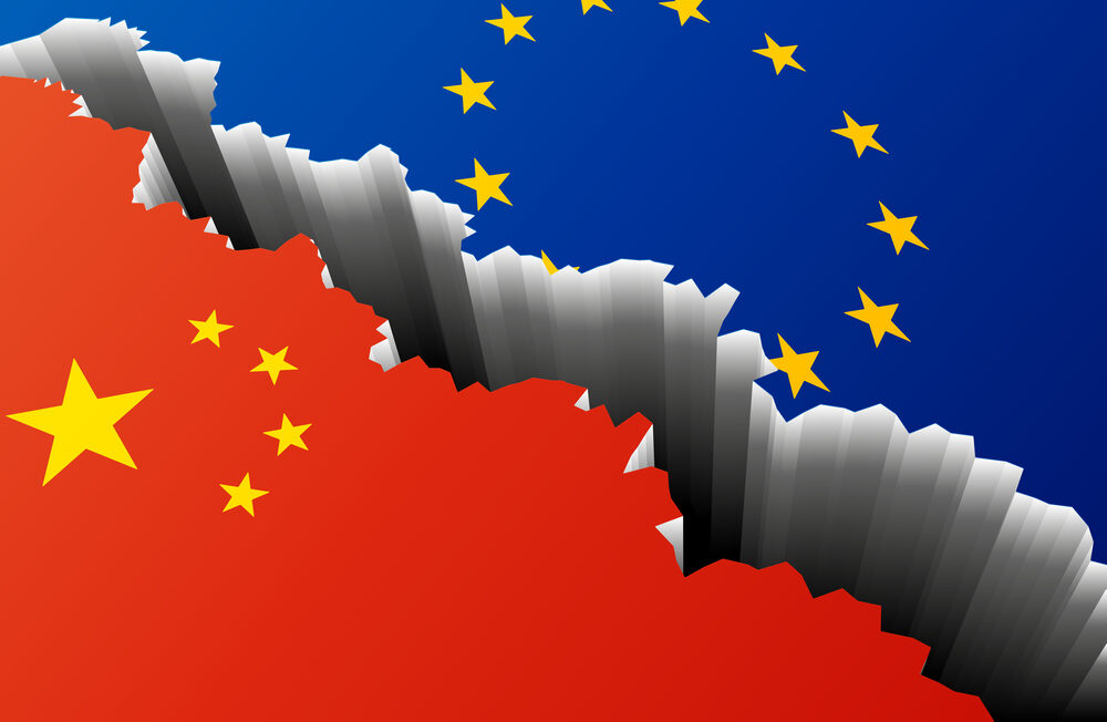 detailed illustration of the european and chinese Flag with a deep crack, symbol for crisis and problems, eps10 vector